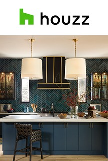 A kitchen with modern design and oversized pendant lights